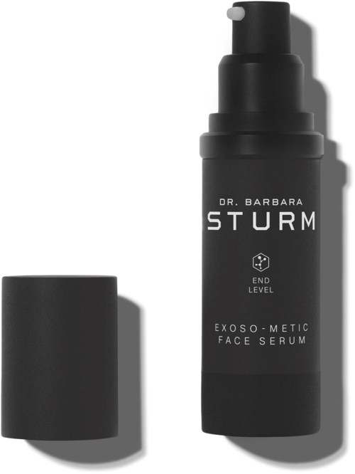 Czarna butelka oznaczona Dr. Barbara Sturm Exo-Metic Face Serum z pokrywką obok.