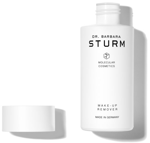 En vit flaska märkt Dr. Barbara Sturm, MOLECULAR COSMETICS, Make-up Remover, tillverkad i Tyskland. Locken är loss.