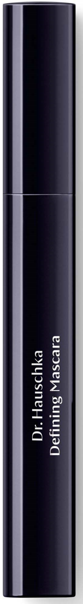 A sleek black tube labeled 'Dr. Hauschka Defining Mascara' on a dark background.