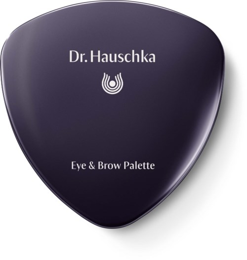 En svart kompakten med vitt text som säger 'Dr. Hauschka Eye & Brow Palette' och en logotyp.