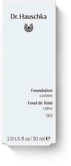En vit box med svart text och en logga visar Dr. Hauschka foundation, med detaljer om storlek och nyans.