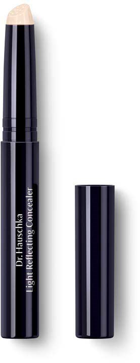En svart stift med beige topp, märkt 'Dr. Hauschka' och 'Lighter Reflecting Concealer', med korken bredvid.