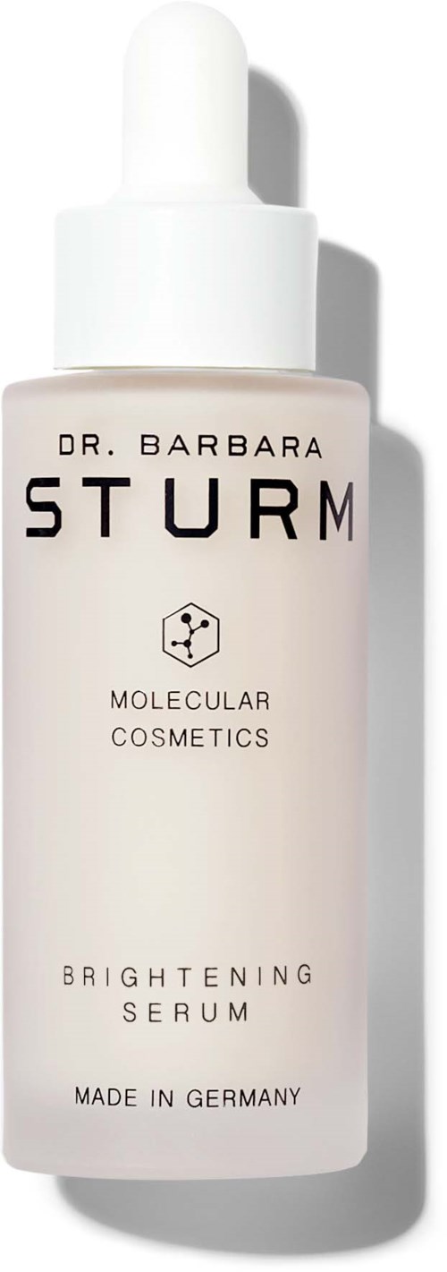 En vit flaska med dropplock, märkt som Dr. Barbara Sturm Brightening Serum, tillverkad i Tyskland.