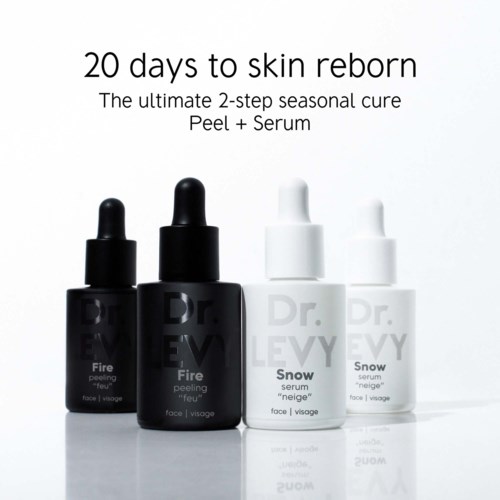 Four skincare bottles, two black labeled Fire and two white labeled Snow, with dropper caps for serums and peeling gel.
