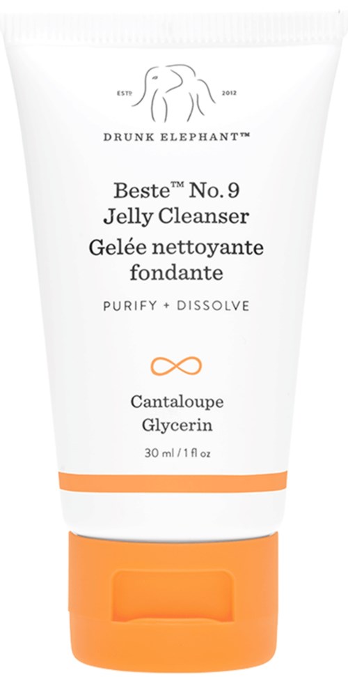 En vit tub med Drunk Elephant gelrengöring med orange lock, märkt 'Beste No.9 Jelly Cleanser' och ingredienslista.
