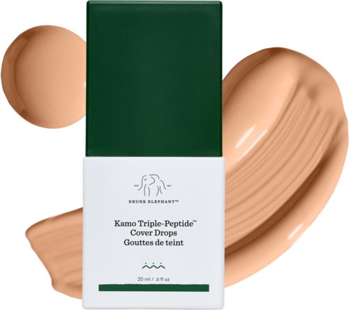 Grön och vit förpackning med Drunk Elephant-logga, visar Kamo Triple-Peptide Cover Drops, med färgprov och dropp av flytande foundation.