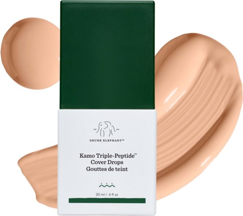 Grönt och vitt ansiktskrämförpackning med Drunk Elephant-logga och produktnamn, med swatches av beige kräm.