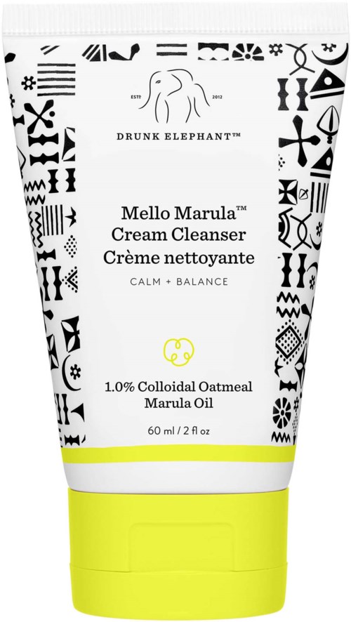 Tube mit Drunk Elephant Mellow Marula Cream Cleanser, schwarze dekorative Muster und gelber Verschluss.