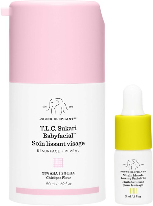 A pink and white bottle of skincare, with a separate small dropper bottle, labelled for face treatment with natural ingredients.