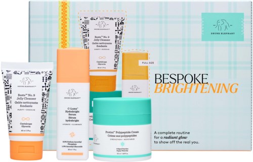Sett med hudpleieprodukter med kremer, serum og rens for opplysning av huden, i fargerik emballasje. Inneholder en eske merket Bespoke Brightening.