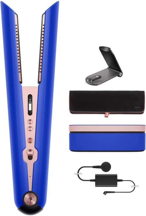 Various grooming tools, including a hair straightener, mini flat iron, cordless shaver, storage case, and charging cable.