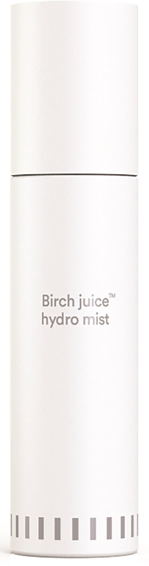 En vit sprayflaska i cylindrisk form med texten 'Birch juice hydro mist'.