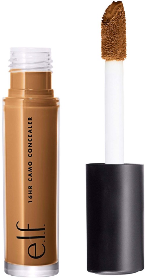 En beige concealer-stift med svart lock och applikatorsvamp. Texten säger "16HR CAMO CONCEALER".