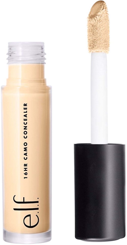Korostuspuikko, jossa beige neste, korkki poissa ja aplikaattori näkyvissä.