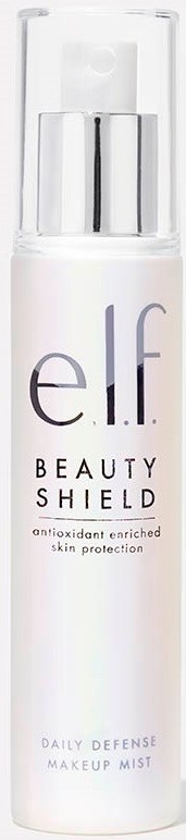 En vit sprayflaska märkt 'elf beauty shield' ger antioxidativt skydd för huden, kallad makeup mist, i en elegant design.