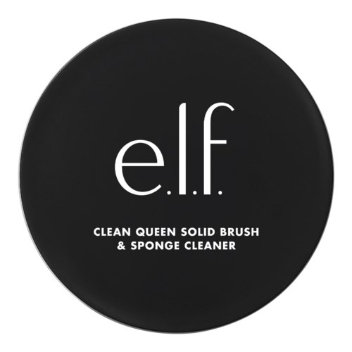 Ett svart runt behållare med vitt text: e.l.f. och en produktetikett för en borste och svampens hygienprodukter.