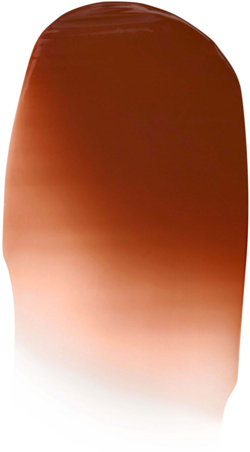 Ett glatt, runt föremål med gradient från mörkbrunt till ljust vitt längst ner.