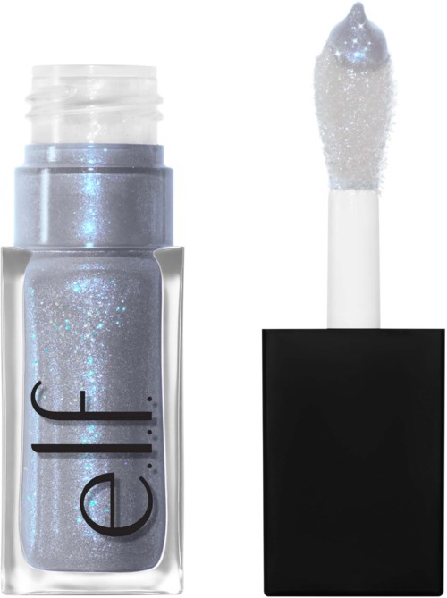 En neglelakkflaske med glitteraktig, sølvfarget og svart lokk, med påføringspennen ved siden av.