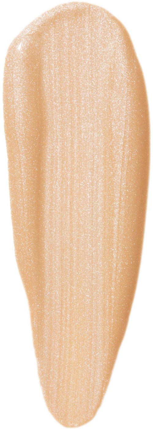 Ett beige sminkborststreck med lätt skimmer syns på vit bakgrund.