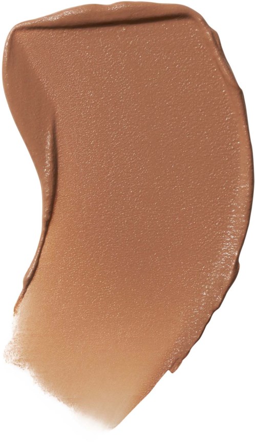 En glatt, buet test av foundationsmiddel i beige farge.