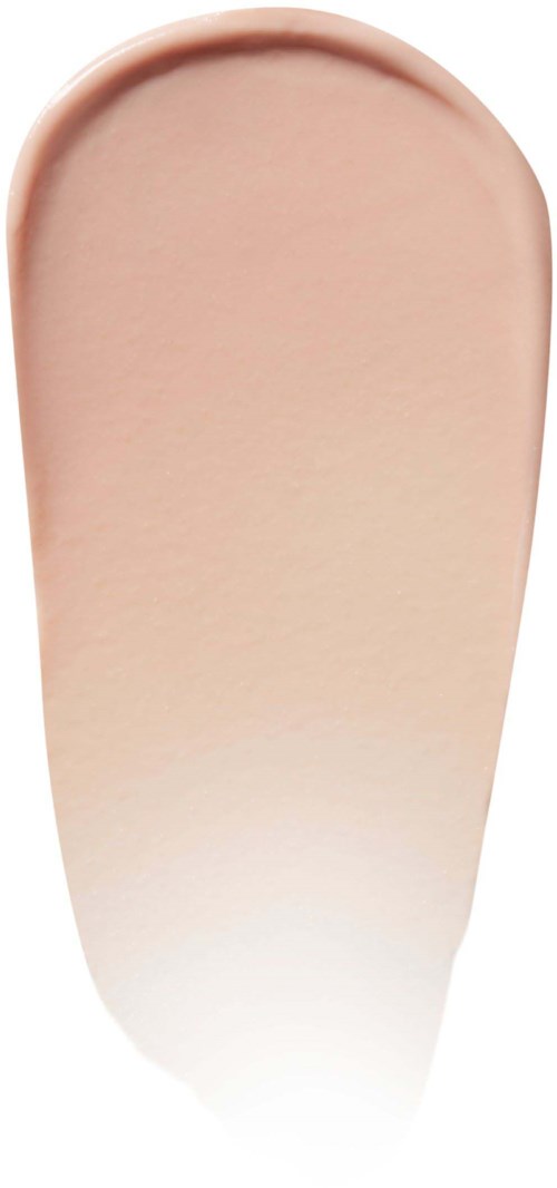 Nærbilde av beige eller lys rosa neglelakk på en fingernegl.