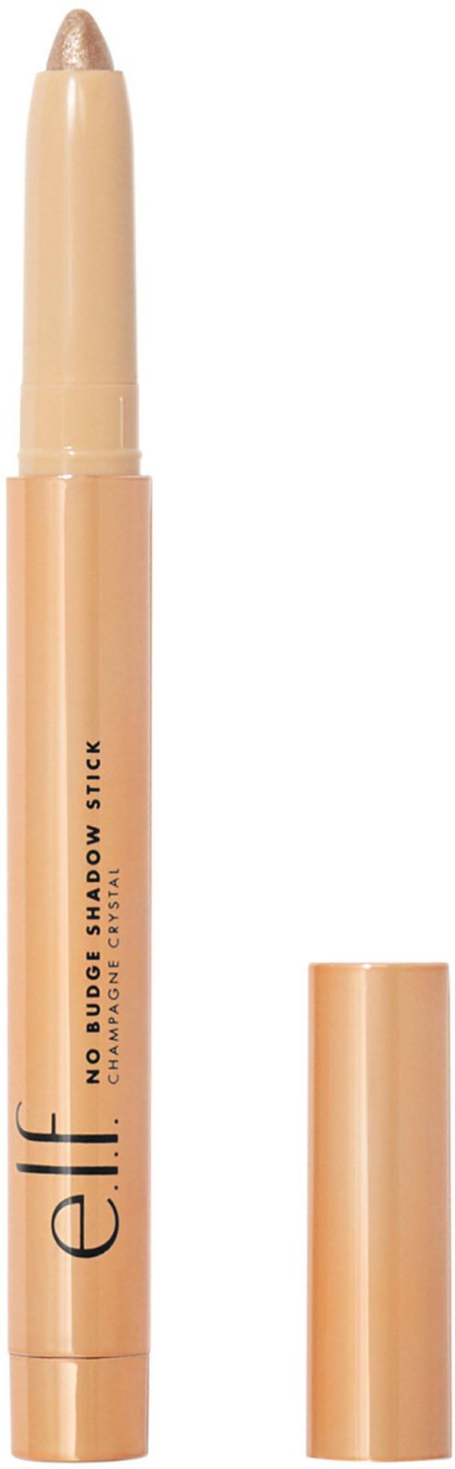 A beige no-budge shadow stick with its cap off. The stick is shaped for eye makeup application. The brand is e.l.f.