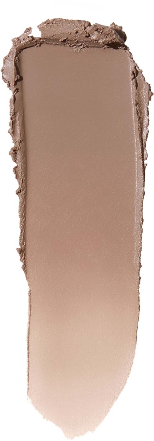 En beige makeup-penna med en slät, krämig textur och spets. Den verkar vara använd för ansikts- eller ögonmakeup.