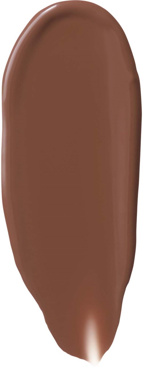 Det är en brun chokladgrej med en slät, förlängd form och en blank yta.