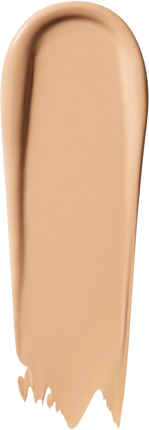 En beige sminksvamp med avrundet topp og flat bunn, brukt til å påføre foundation.