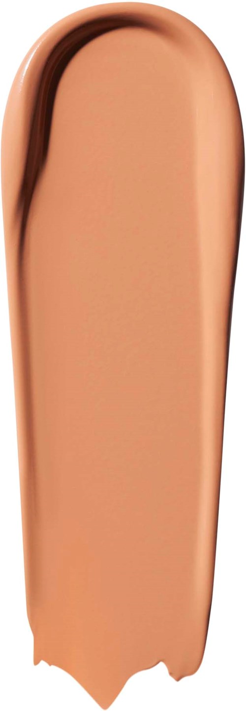 En concealer-odd med metallisk rosegullhette.
