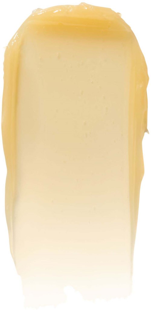 En bit gul och vit ost med något ojämnt kanter och slät yta.