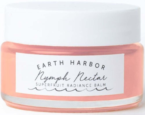 Een pot Earth Harbor Nymph Nectar superfruit radiance balm met witte deksel en roze inhoud.