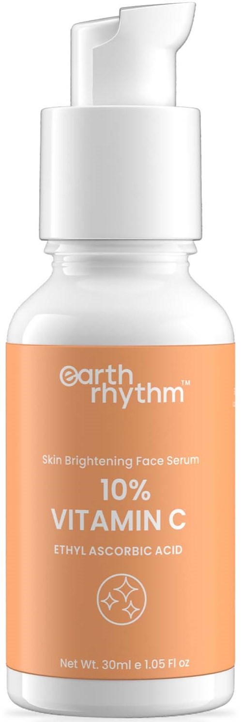 En liten vit flaska med orange etikett som visar att det är ansiktsserum med C-vitamin, med pump.