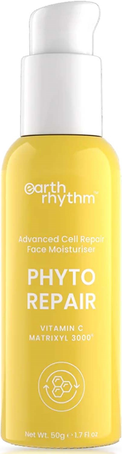 Żółta butelka kremu do twarzy Earth Rhythm z białą pompką, oznaczona 'Phyto Repair' z witaminą C.