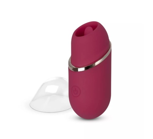 En liten, lila, bärbar enhet med ett tydligt skydd, kanske ett personligt skönhets- eller hälsogadget.