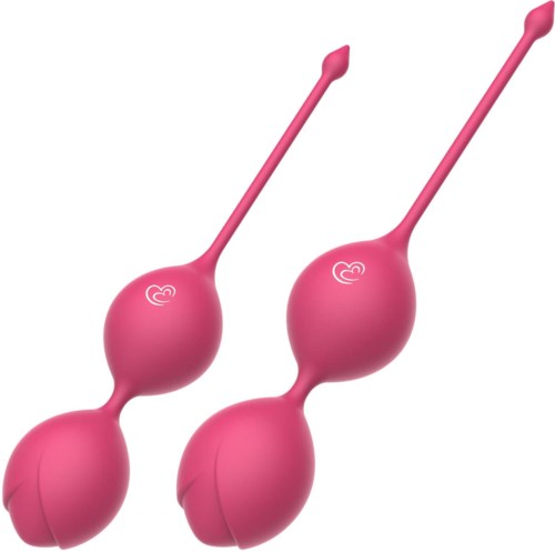 Two pink Kegel balls with long strings, used for pelvic exercises.
