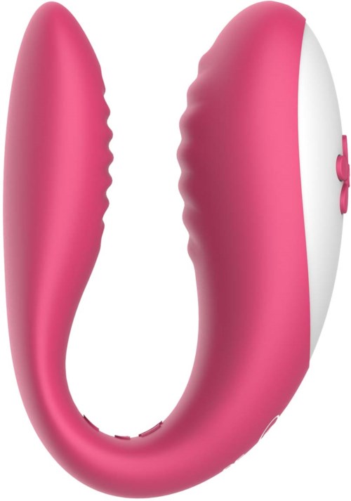 A pink device with a curved shape, textured side, and a control button on the white part.