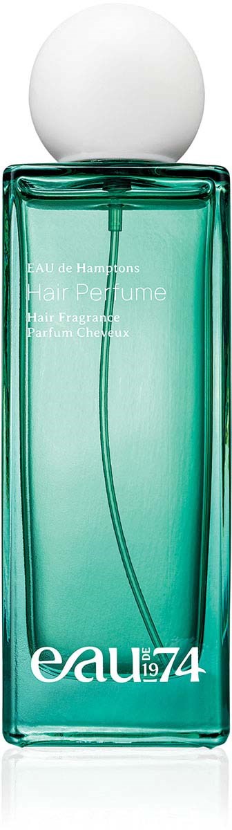 A green perfume bottle with a white round cap and the text 'eau 74' at the bottom.