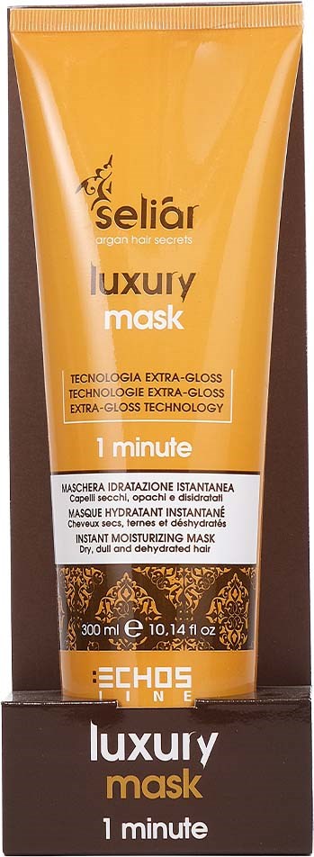 En gul og svart tube av Seliar luksuriøs fuktighetsgivende maske for tørt, kjedelig hår, som skal virke på 1 minutt.