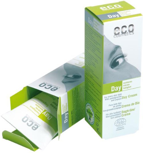 ECO cosmetics dagkrämförpackning visar ett ansikte med ögon och gröna, blå och vita färger.