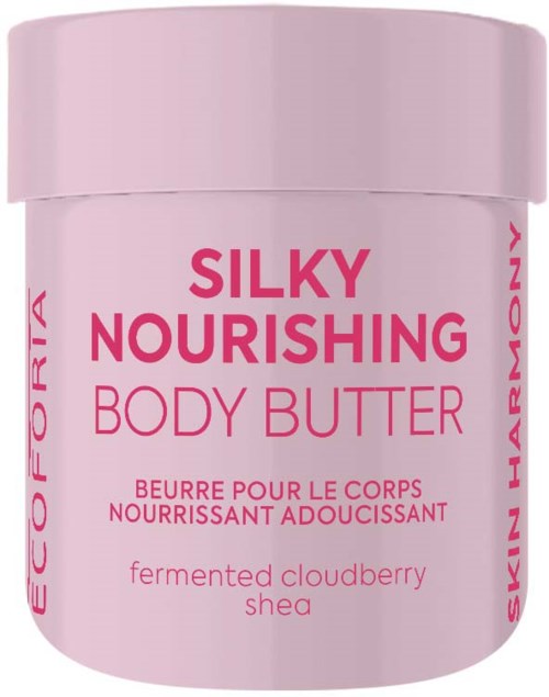 Ljusrosa behållare med body butter och texten "Silky Nourishing" och "Shea" på.