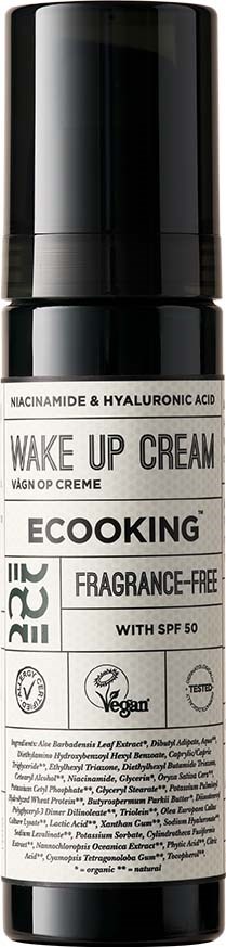 En svart och vit flaska märkta 'Wake Up Cream' av Ecooking, innehållande ingredienser som niacinamide och hyaluronsyra.
