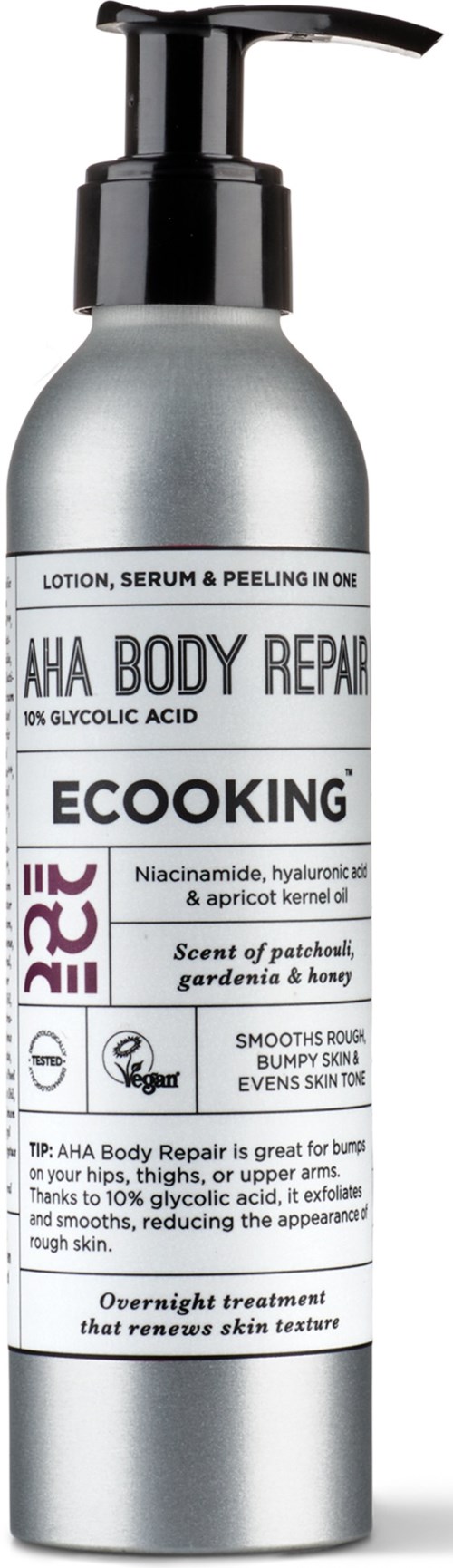 En sølvfarvet flaske med pumpe, mærket som kropsreparationslotion med syrer og naturlige ingredienser til huden.
