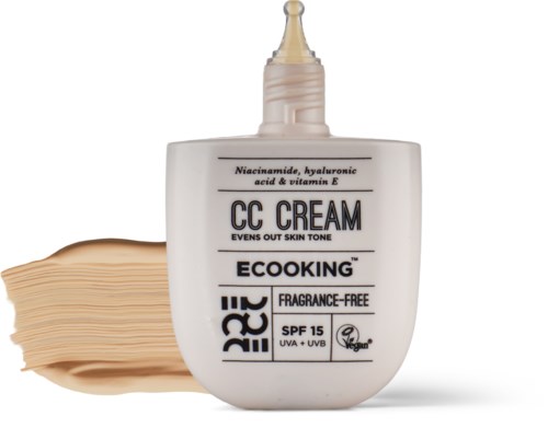 Tubes af CC-cream med SPF 15, parfumefri, vegansk og jævn hudtone, sammen med en hudplejecreme.