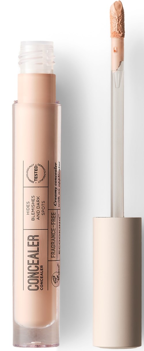 Concealer i rør med applikator, i beige, til at skjule hudfejl.