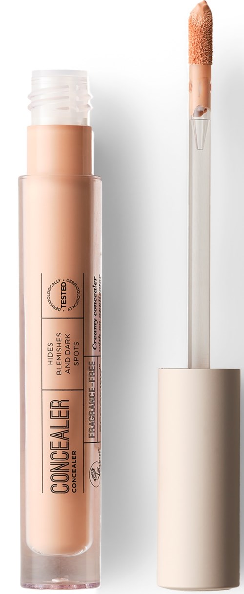 En concealer-pensel med applikator, lys beige farve, og produktnavn på etiketten.