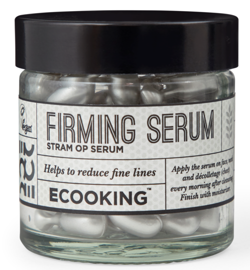 En glas med mærket 'Firming Serum' fra EcoKing, der hjælper med at reducere fine linjer, indeholder kapsler og skal bruges i ansigtet.