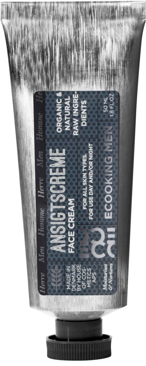 En tub med ansikts- och kroppskräm märkt 'Ansigtscreme' med naturliga ingredienser, svartvitt text och svart lock.