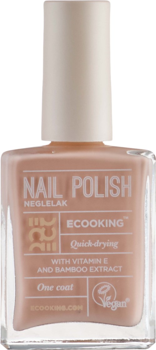 A beige nail polish bottle with a white cap, labeled as quick-drying with bamboo extract and vitamin.