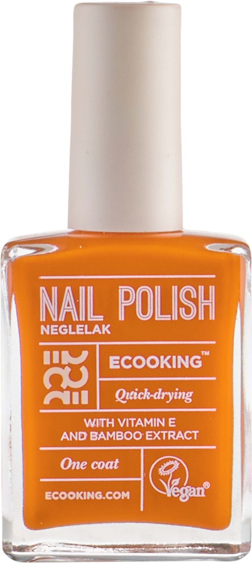 Orange nail polish bottle with white cap, labeled as eco-friendly, quick-drying with vitamin E and bamboo extract.